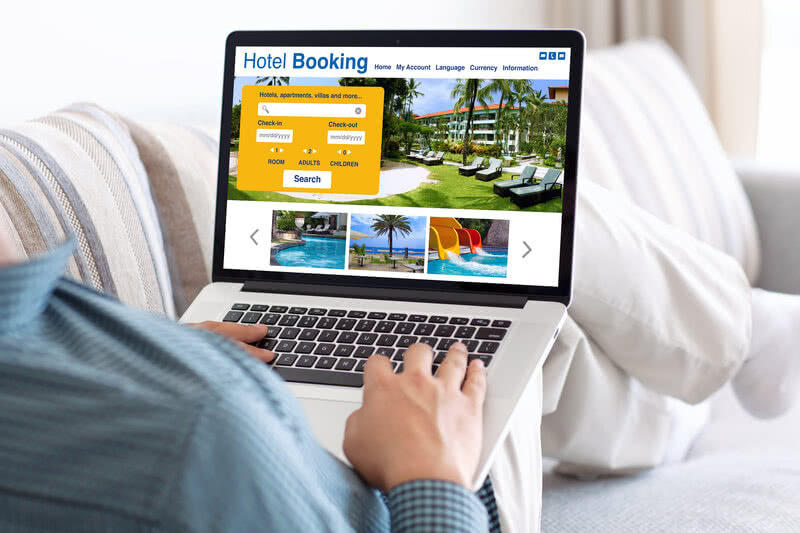 man booking a hotel direct