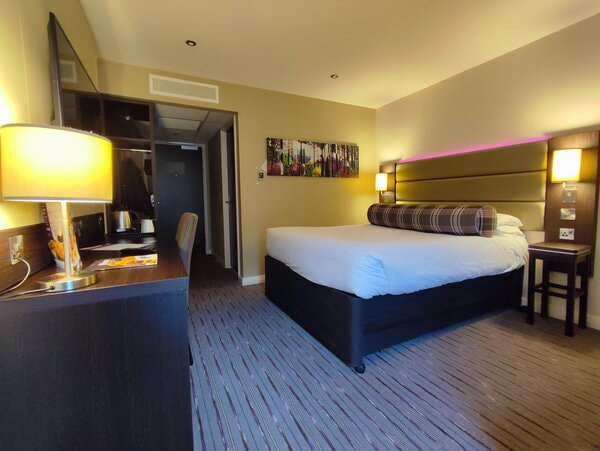 Premier Inn York hotel bedroom showing kingsize bed and desk