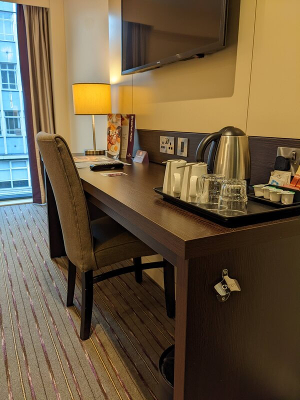 Premier Inn room desk with tea/coffee making facilities